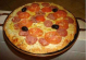 Forma de pizza em pedra sabo  de 40 cm sem alas e sem aro